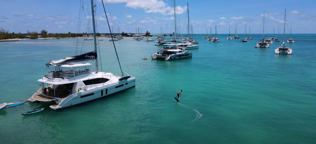 fliteboard in water near boats