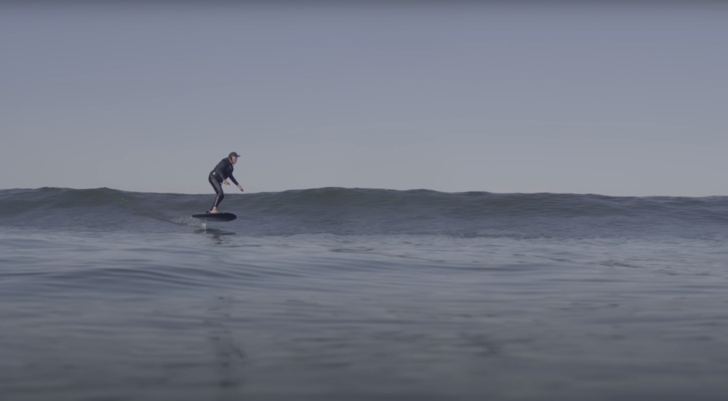 efoil surfing in ocean