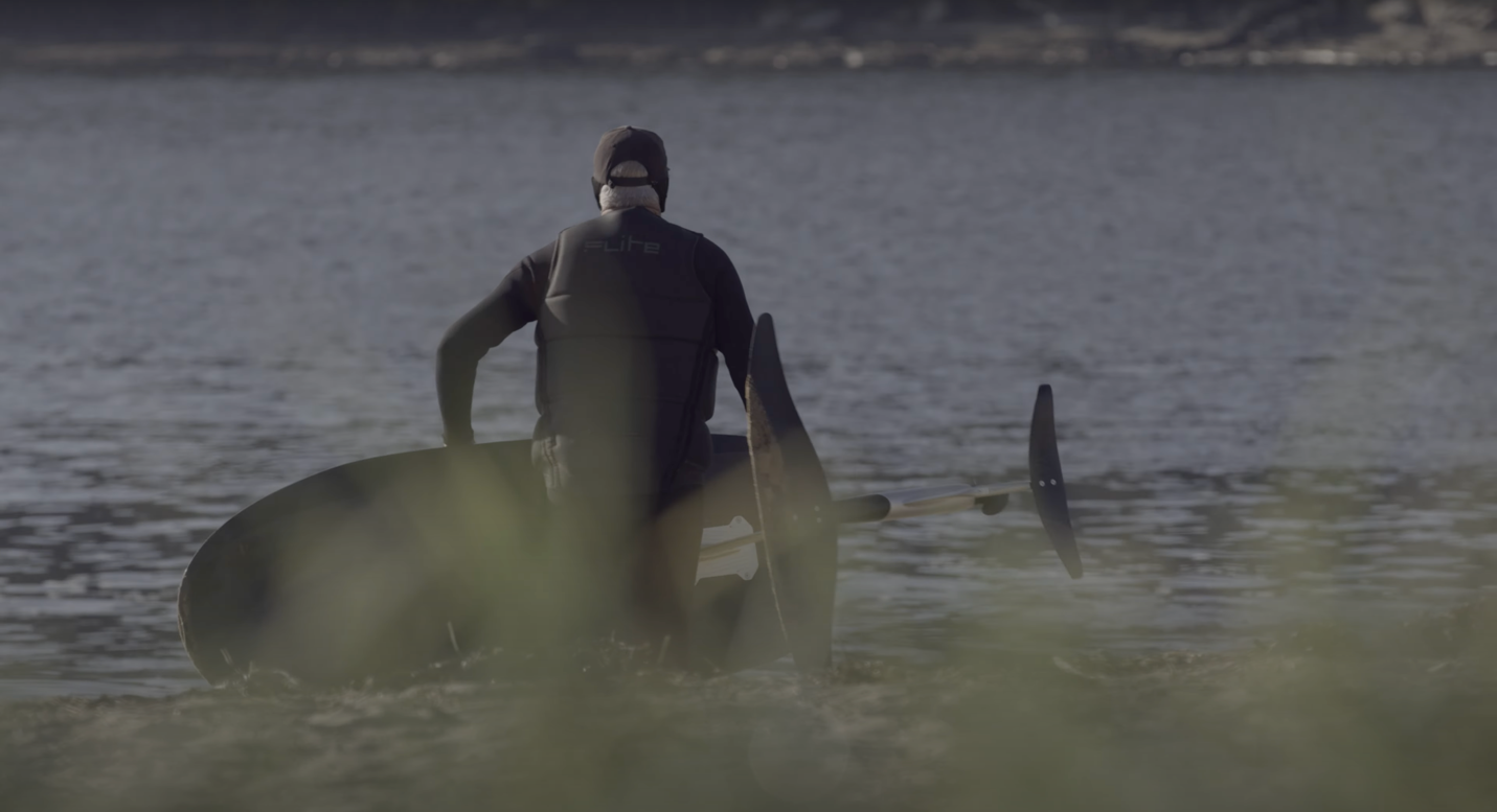 fliteboard user heading into water