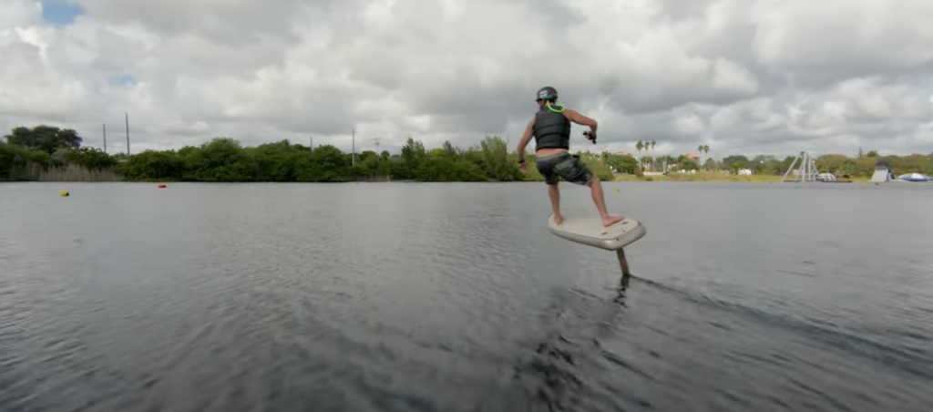 man riding fliteboard