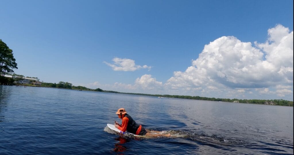 man in the water on board