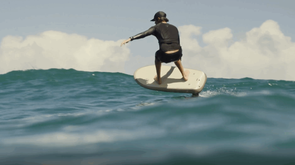 Rider foiling on a used Fliteboard demo eFoil in Florida waves